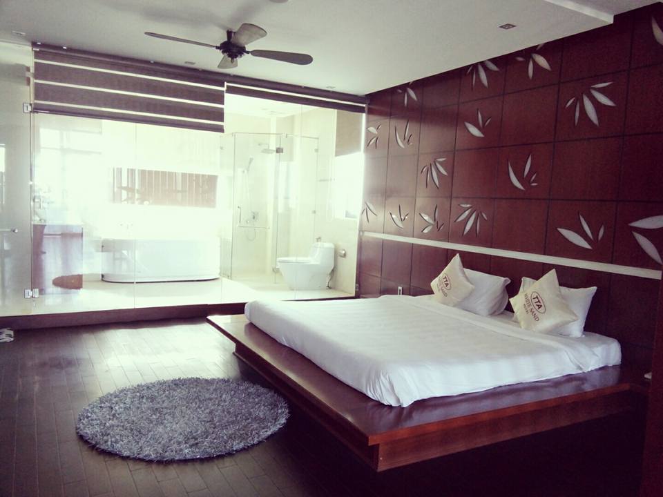 Giường ngủ trong phòng tại khách sạn White Sand II Đà Nẵng